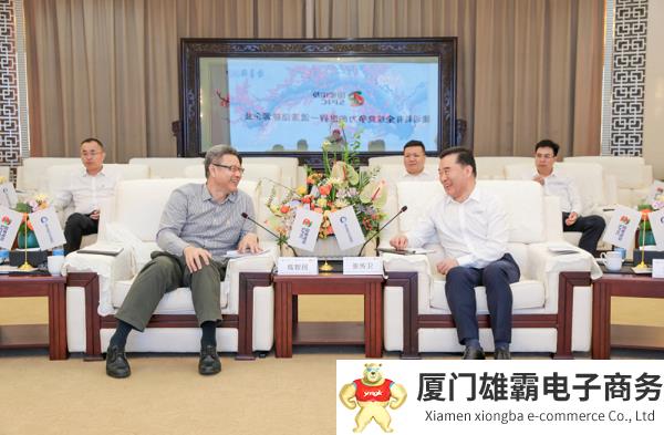 明阳集团党委书记、董事长张传卫与国家电投党组书记、董事长钱智民会谈